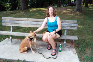 Alyce on park bench with Una (Click to enlarge)