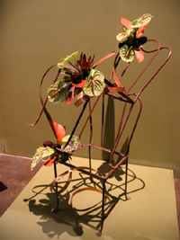 Flower arrangement with chairs (Click to enlarge)