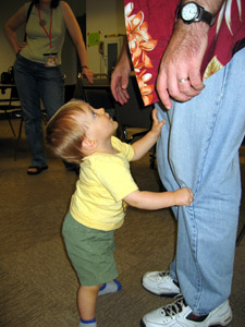Little boy standing with Dad's help (Click to enlarge)