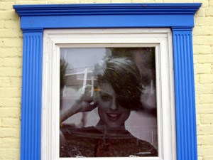 Poster in window, close-up (Click to enlarge)