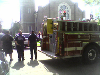 Firefighters saluting (Click to enlarge)