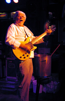 The Sauce Boss plays guitar (Click to enlarge)