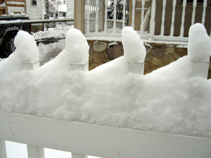 Snow on a white fence (Click to enlarge)