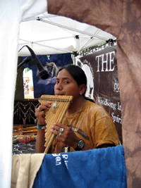 Pan flute player (Click to enlarge)